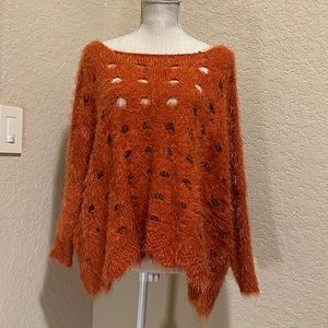 Pumpkin sweater off the shoulders. So unique size L/Xl